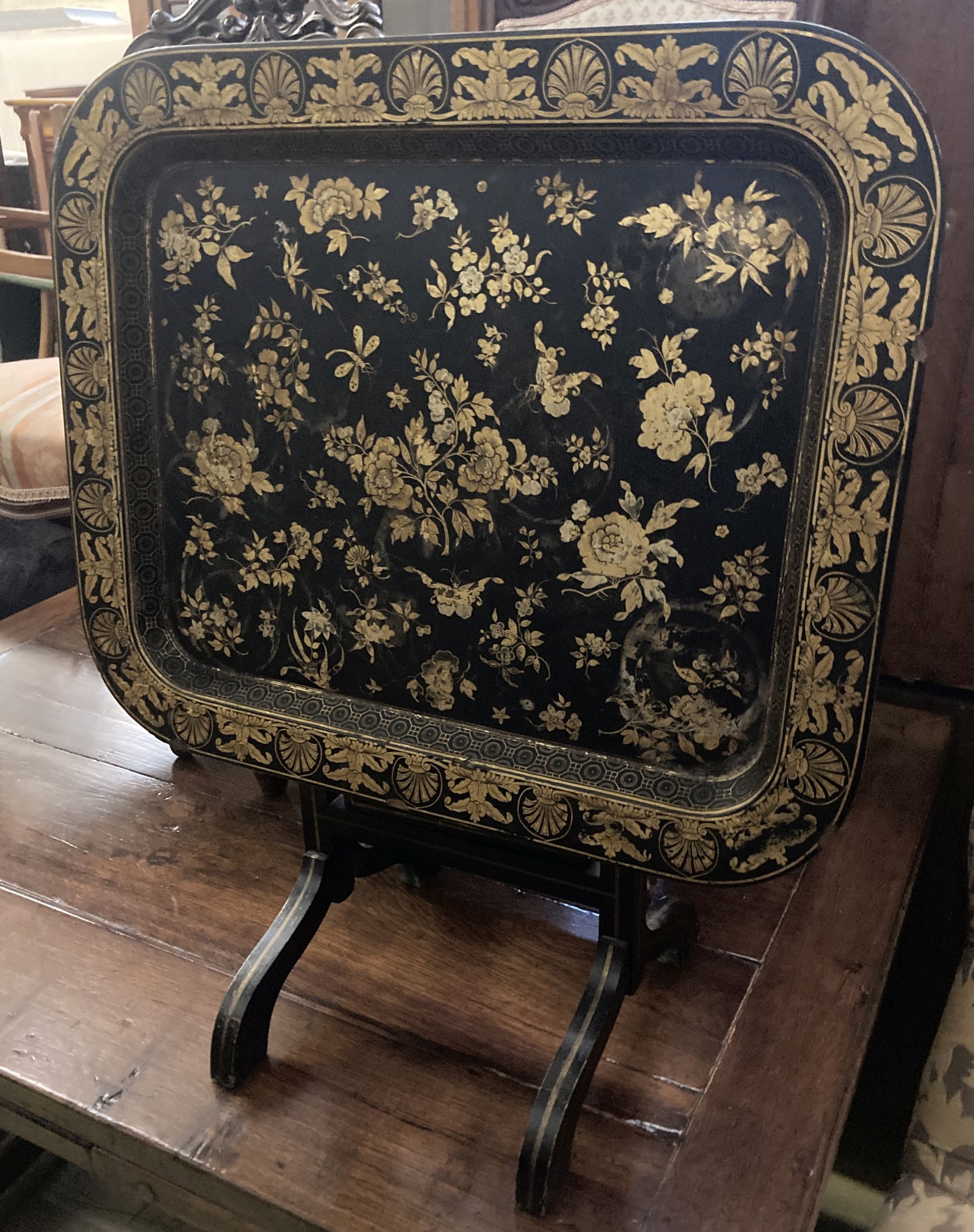 A Regency style rectangular chinoiserie gilt lacquered folding tray table, width 55cm, depth 46cm, height 50cm